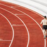 Athlete sprinting on an outdoor running track