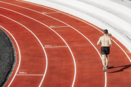 Athlete sprinting on an outdoor running track