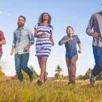 Young adults running outdoors as an example of regular exercise for heart health