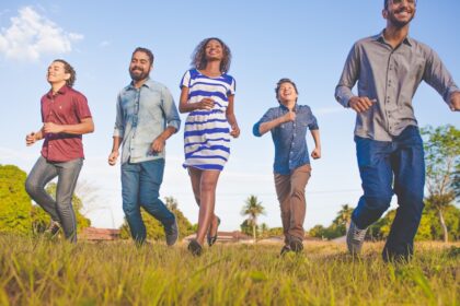 Young adults running outdoors as an example of regular exercise for heart health