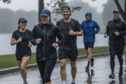 People running outdoors in rainy weather during everyday physical activity