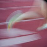 High school athlete running on a track, the sprint test used in suspension training research