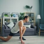 Adult performing push-ups during a home bodyweight resistance workout