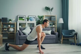 Adult performing push-ups during a home bodyweight resistance workout