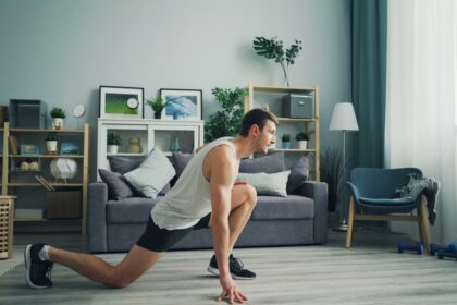 Adult performing push-ups during a home bodyweight resistance workout