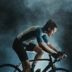 Cyclist riding indoors during a study of muscle activation in incremental cycling