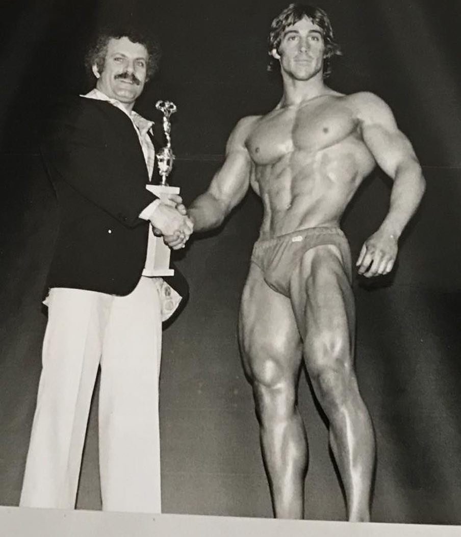 John DeFendis in an archival bodybuilding photograph from the official Ultra Fit website