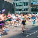 Marathon runners on a city street, illustrating endurance training and lung function research