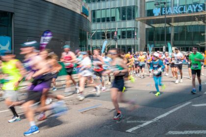 Marathon runners on a city street, illustrating endurance training and lung function research