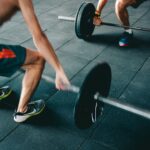 Resistance training muscle hypertrophy study with an athlete lifting a barbell
