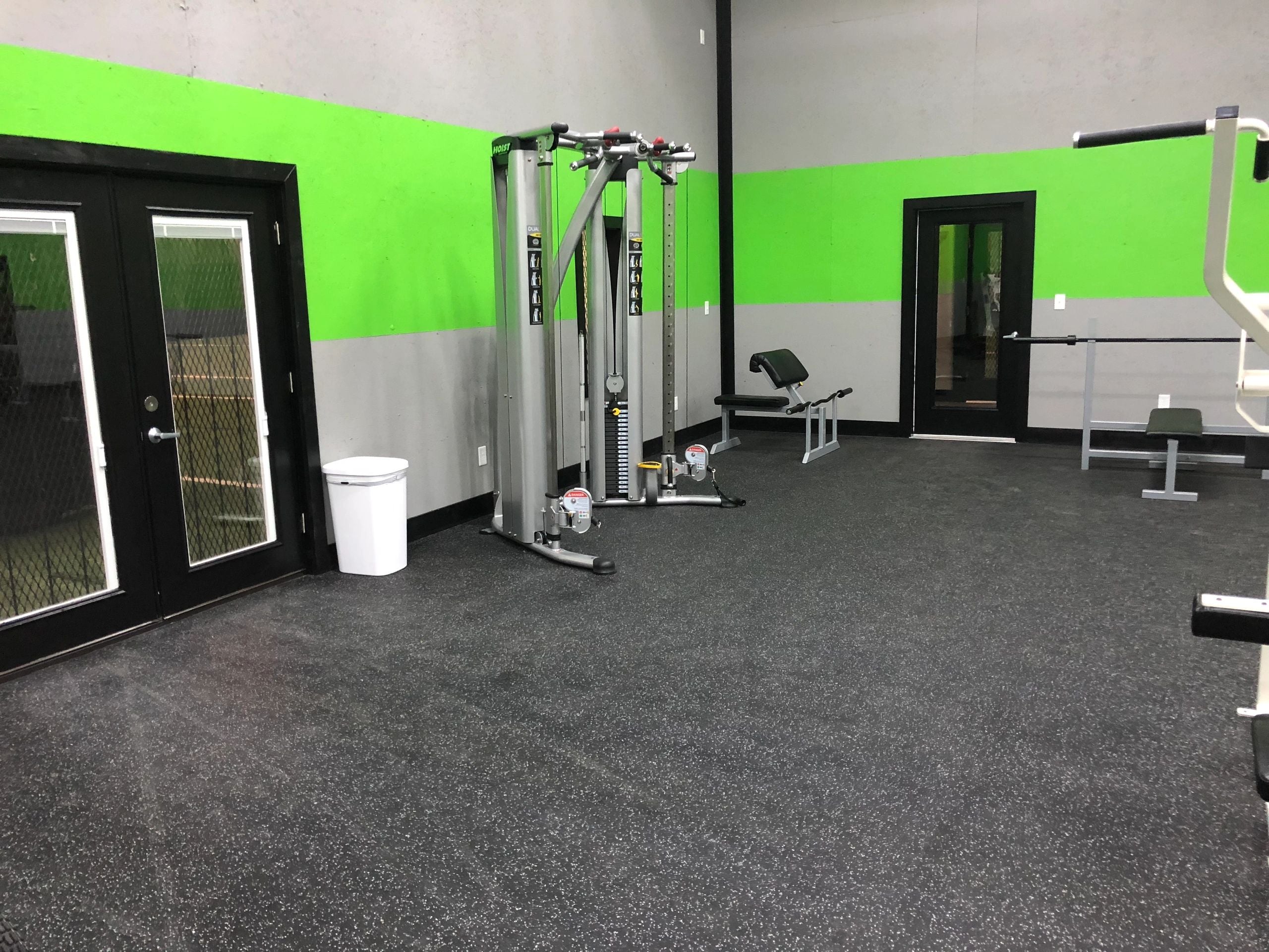 Cable training equipment and open floor space at Stars Sports and Fitness