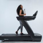 Athlete running on a treadmill during a fitness workout