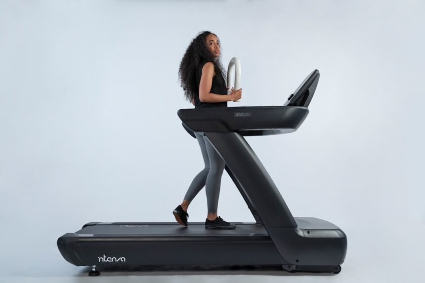 Athlete running on a treadmill during a fitness workout
