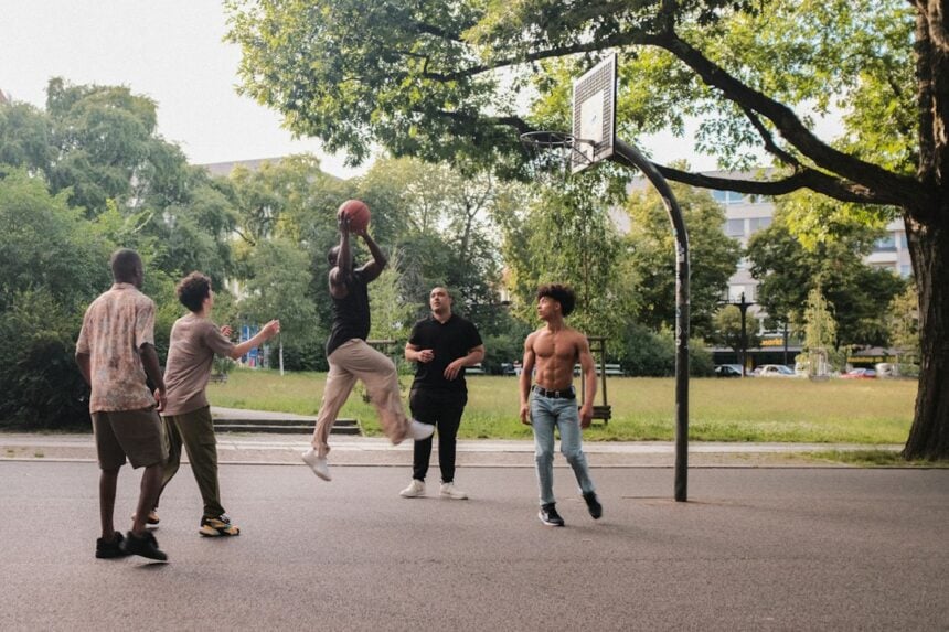 Adolescent basketball players in a conditioning session that trains aerobic capacity