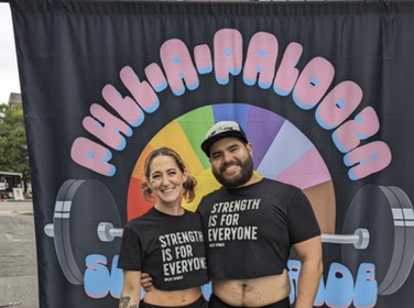 Devon Walker and Rena of Uplift Fitness in Seattle wearing Strength Is For Everyone shirts