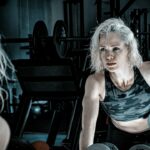 Adult training with weights in a gym, the setting for creatine supplementation and resistance training research