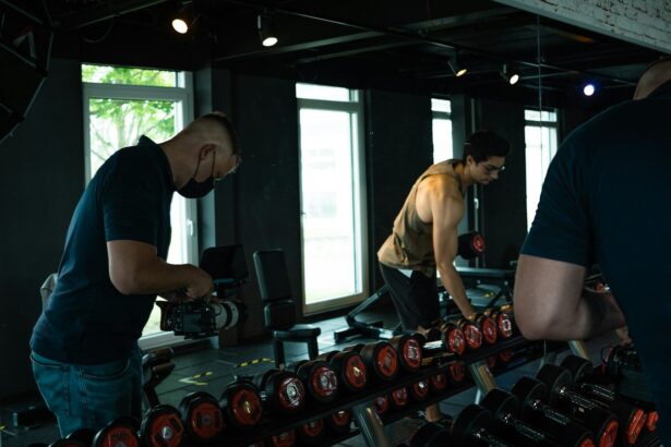 Adults lifting weights in a gym, illustrating exercise trials in adults with metabolic syndrome