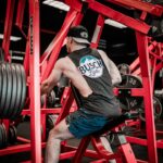 Athlete lifting in a gym, the training context for the yeast protein recovery trial