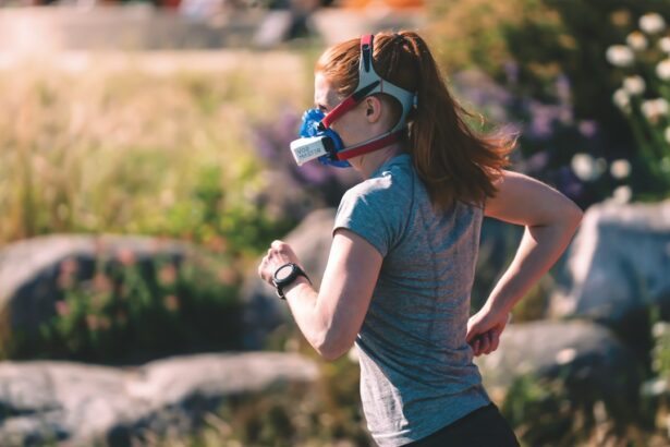 Endurance athlete running on an outdoor track during physiological testing, the population in which t-wave inversions are screened