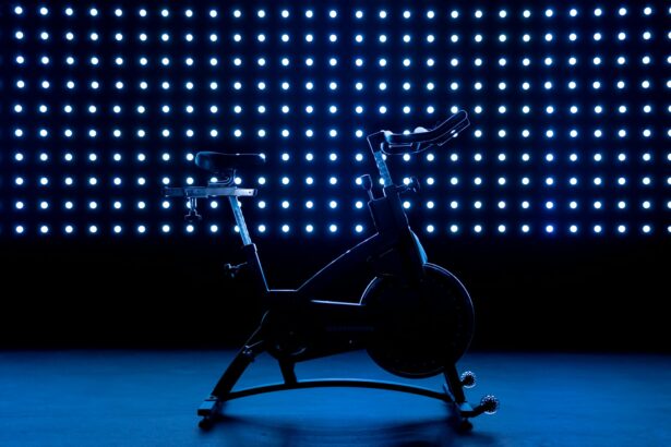 Stationary exercise bike against a blue background