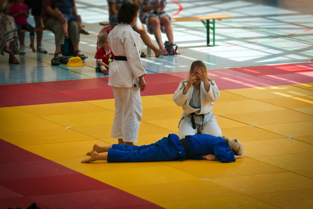 Judo athletes on the mat, one of five combat sports disciplines included in the reaction study