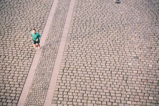 A recreational runner mid-stride on a city path, the population studied in gait retraining research