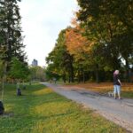 Resident walking an urban park trail, illustrating exercise access close to home