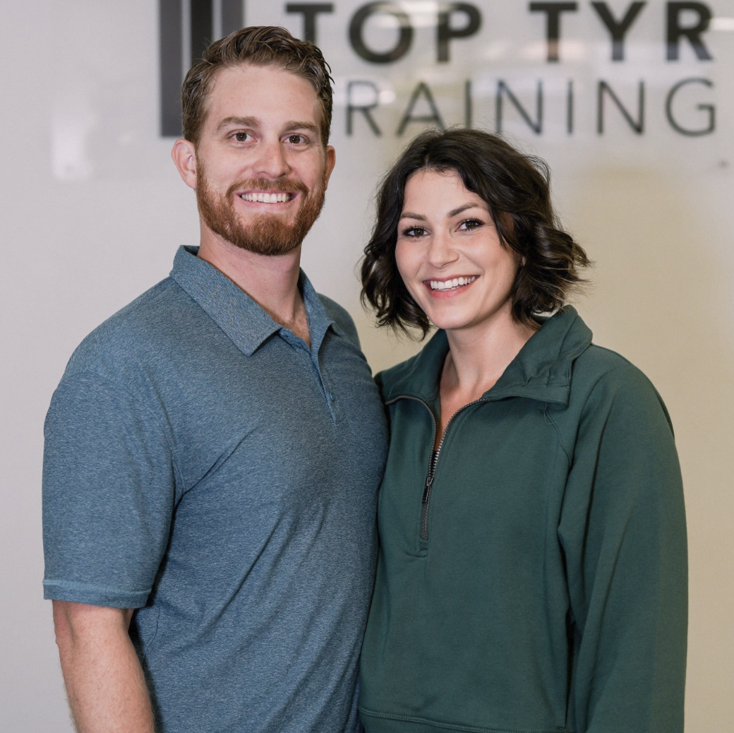 Ian Johnson and Jenna Johnson, owners of Top Tyr Training, inside their Torrance studio