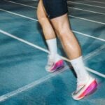 Athletes in a track training session of the kind where compression garments are worn