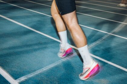 Athletes in a track training session of the kind where compression garments are worn