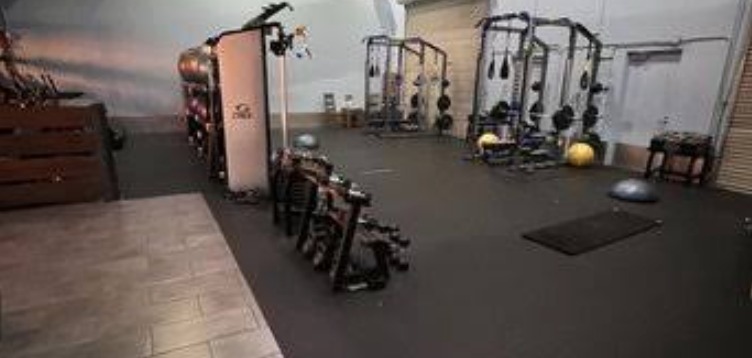 The Solid Core Fitness training floor with matching stations and no waiting