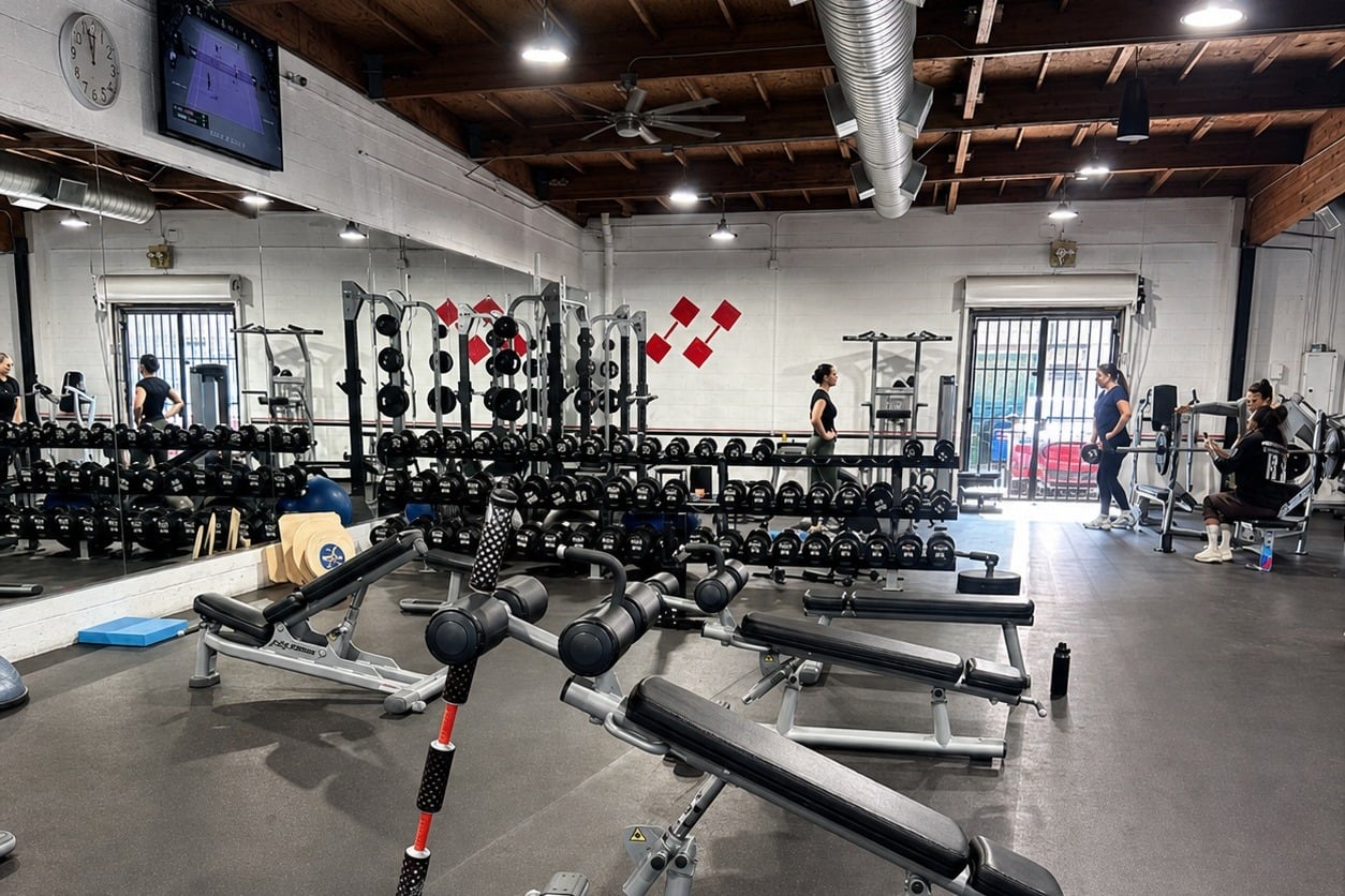 Strength training equipment and open floor space at Transform Fitness in Los Angeles